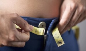 Come ridurre il grasso nell'addome