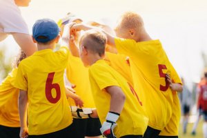 Benefici degli sport di squadra per i bambini