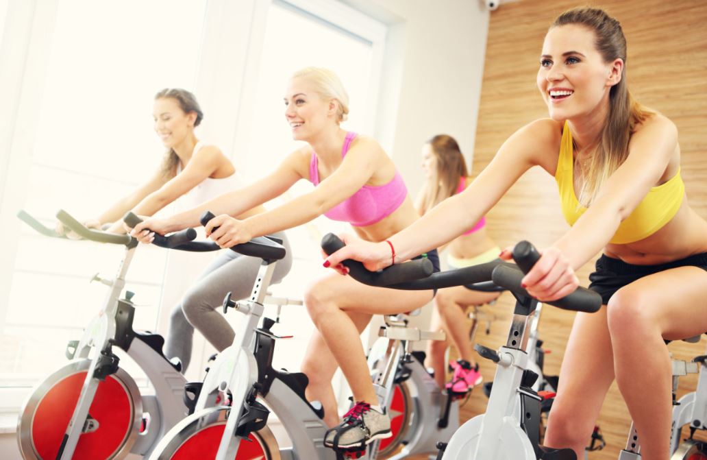 3 Women in Spinning Class
