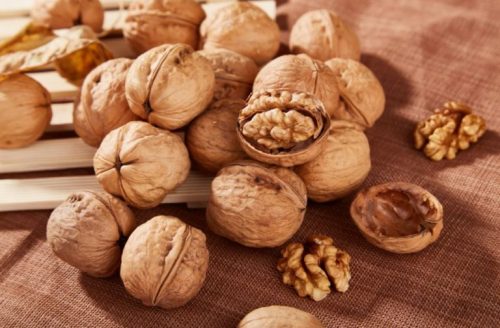 whole and cracked walnuts
