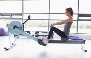 Woman on rowing machine