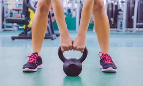 woman kettlebell gym accessories for people over 40