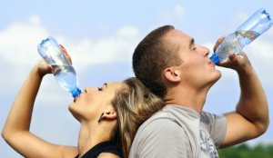 Couple drinking water