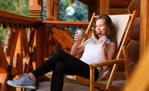 Girl eating oatmeal nut cookie.