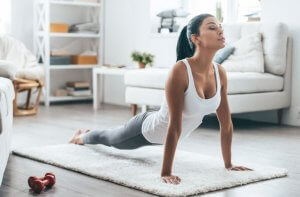 Woman doing Pilates at home