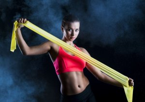 Woman holding exercise band