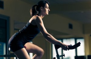 Woman on stationary bike