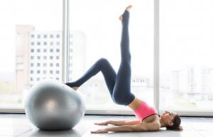 Woman using exercise ball
