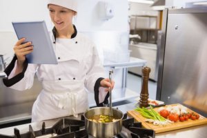 Woman making a homemade broth.