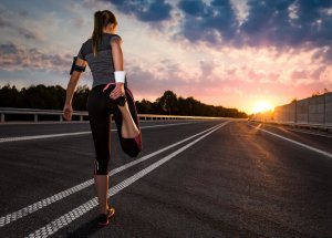 Girl stretching before go running.