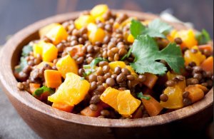 Pumpkin with lentils in a plate.