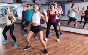 Group of people enjoying the exercise.