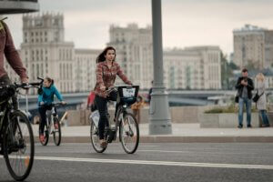 Woman riding a bike around the city