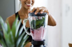 Girl making a smoothie