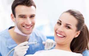 Woman in his dentist avoiding Halitosis