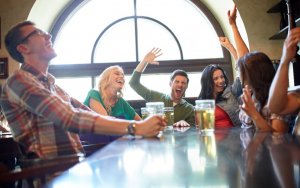 Group of people experiencing some effects of alcohol consumption