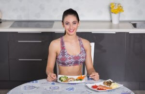 Woman eating light dinner