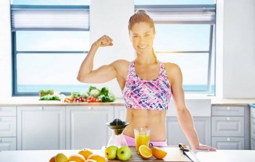 Muscle woman flexing in kitchen small changes