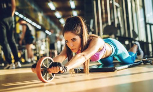 Woman working on ab roller