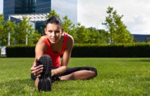 Woman warming up before doing CrossFit training routines