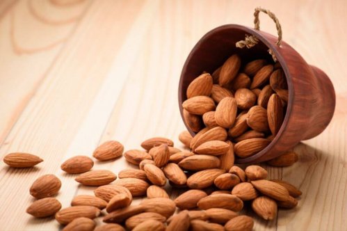 Eating almonds from a container