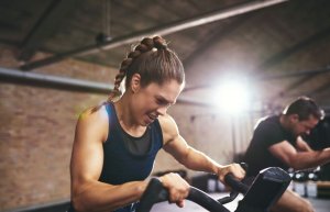 Woman overtraining to improve her performance.