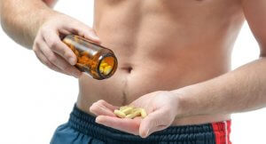 Man taking supplement as food substitute.