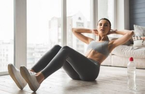 Girl working her abs with pyramid training