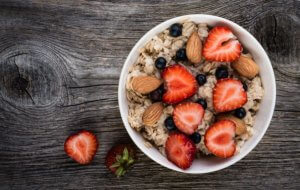 A bowl of yogurt and fruits