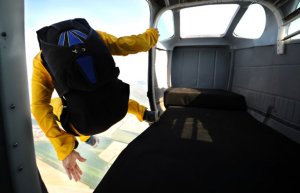 Man jumping for skydiving.