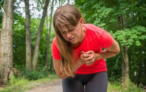 Woman clutching chest