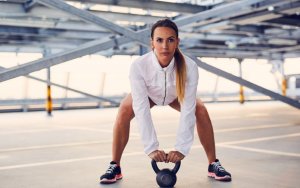 Woman doing sumo squats