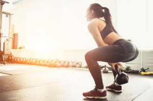 Woman exercising at gym