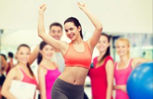 Woman doing exercise in group.