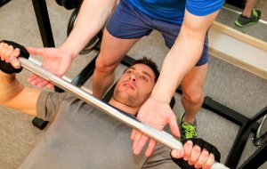Man doing bench presses during his chest workout