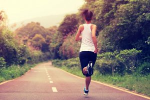 Woman running on the road