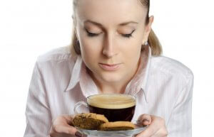 A woman drinking coffee