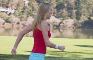 Woman power walking in the park.
