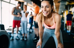Smiling woman at gym