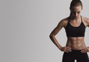 Woman with ripped abs