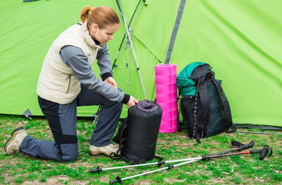 woman sleeping bag tent