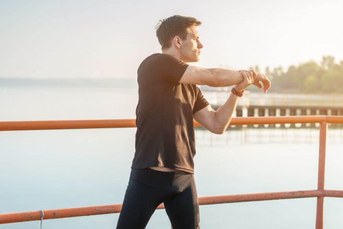 Man doing static stretching exercises