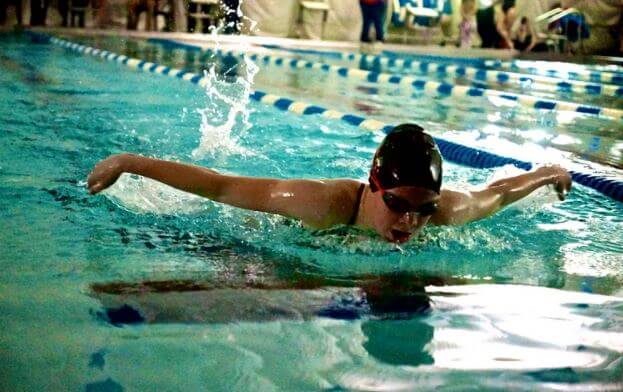 woman swimming butterfly
