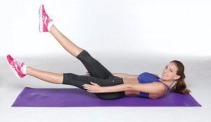 Woman doing the scissors exercise