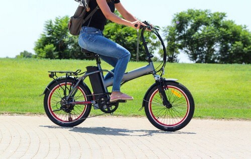 Woman riding electric bicycle