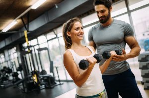 fitness routine for women, dumbbells
