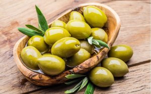 A bowl full of fresh olives