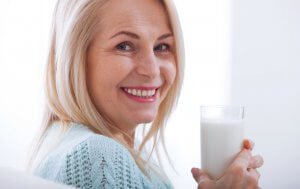 Woman drinking a fermented beverage