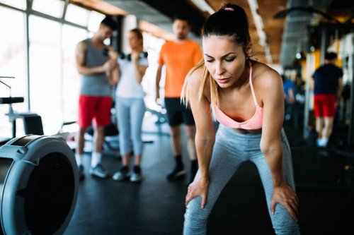 Woman resting in the middle of her workout