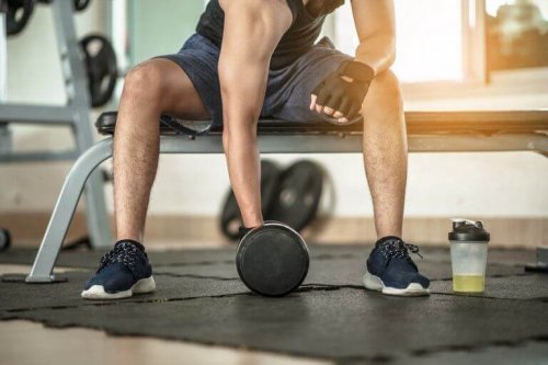 Man performing bicep curls with dumbbells